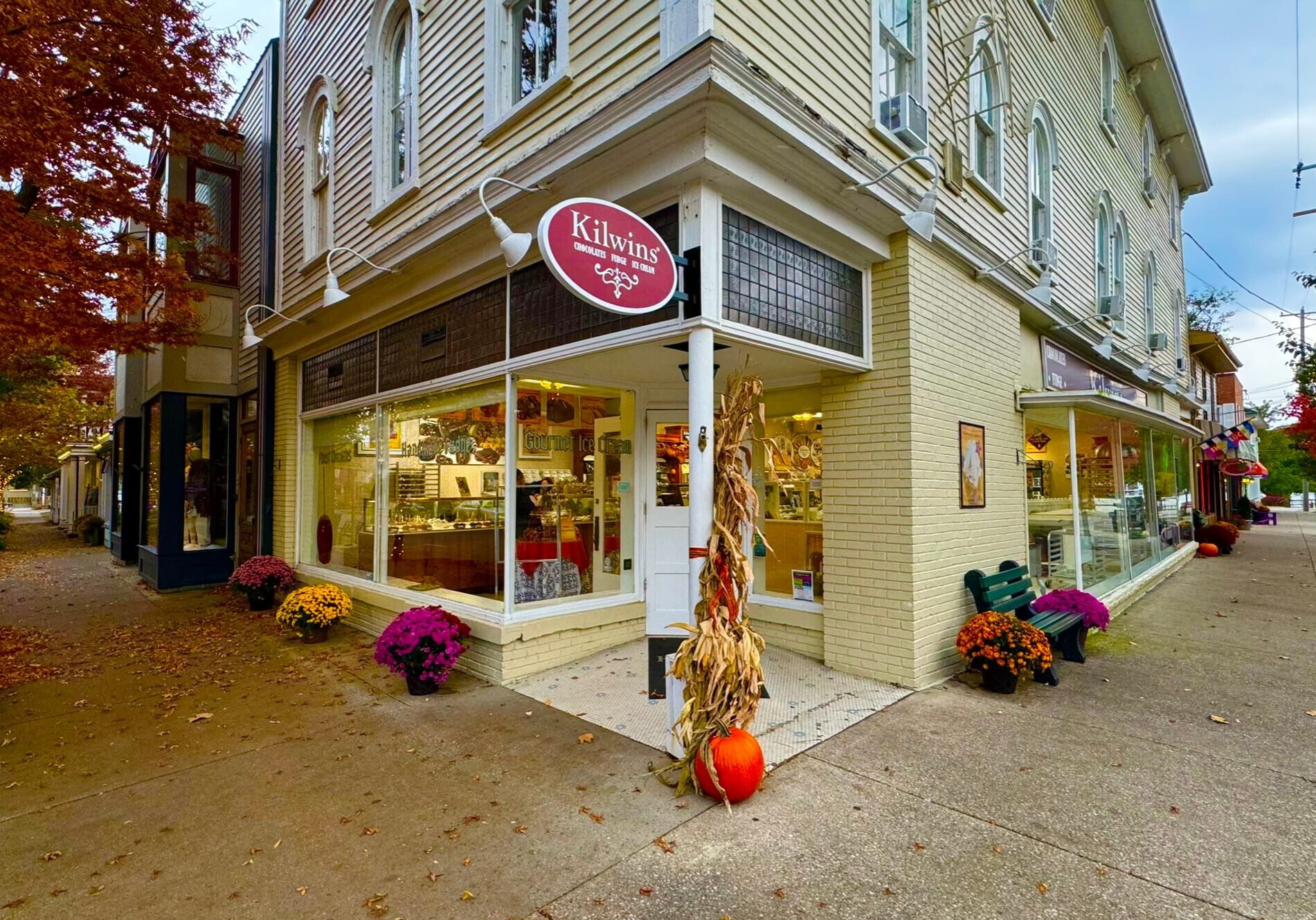 Corner candy and ice cream shop in autumn