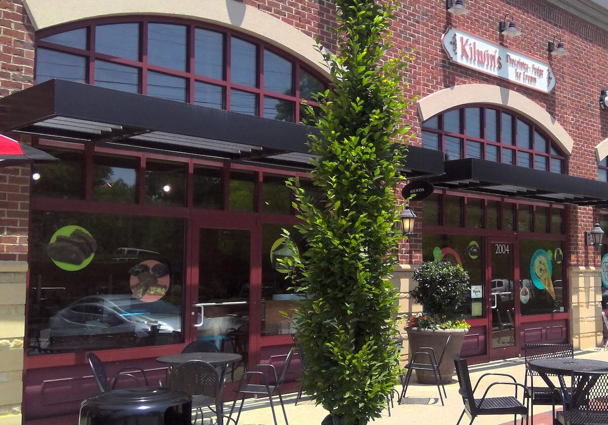 Outdoor seating area at a brick ice cream shop